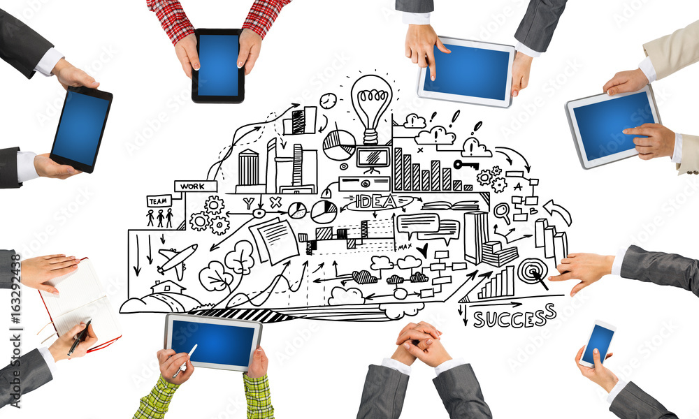 Top view of businesspeople sitting at table and using gadgets Top view of businesspeople sitting at table and using gadgets