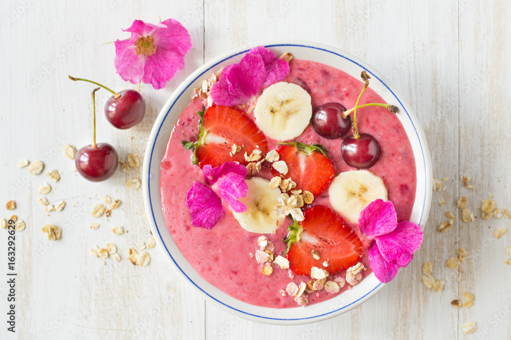 Smoothies with yogurt, strawberry, banana, cherry granola Smoothies with yogurt, strawberry, banana, cherry granola
