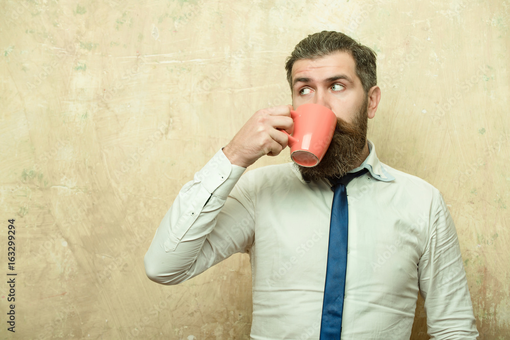 man with surprised face drink tea from coffee cup man with surprised face drink tea from coffee cup
