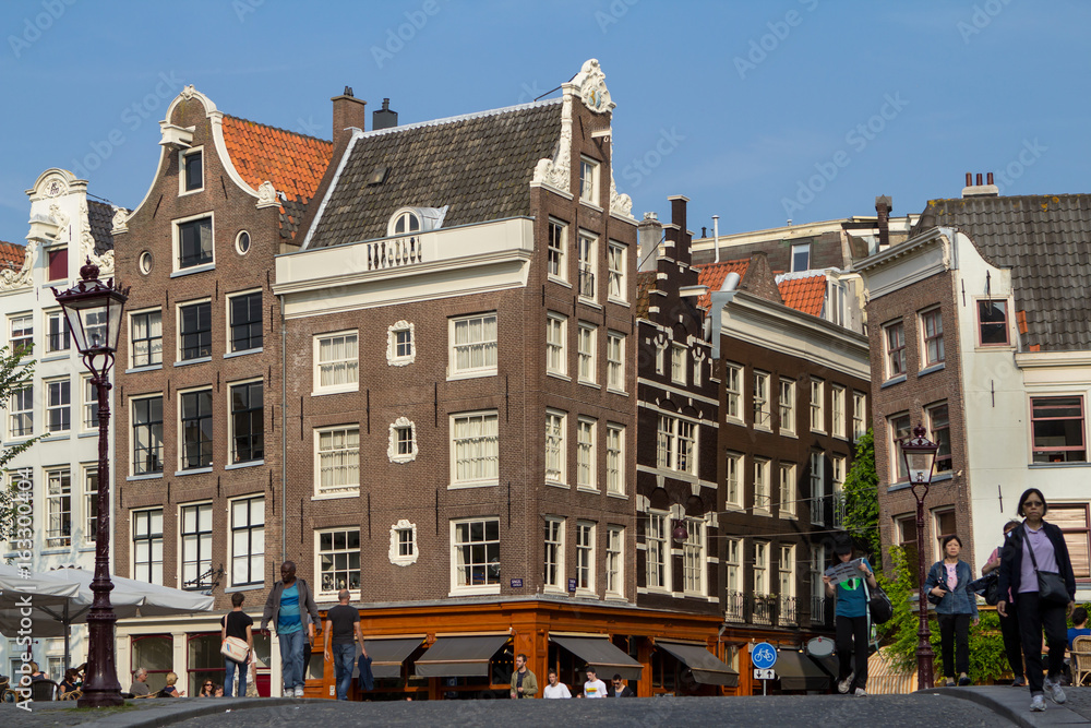 Fototapeta premium Traditional old buildings in Amsterdam