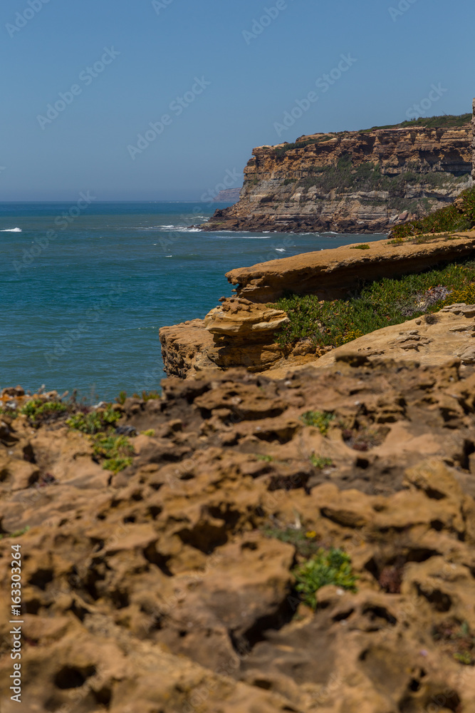 view on coast line rocks in ocean