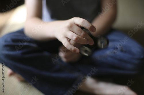 Little Boy Playing with a Fidget Spinner