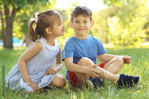Cute little children sittin...