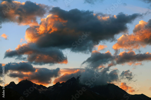 Orange clouds in the high mountains