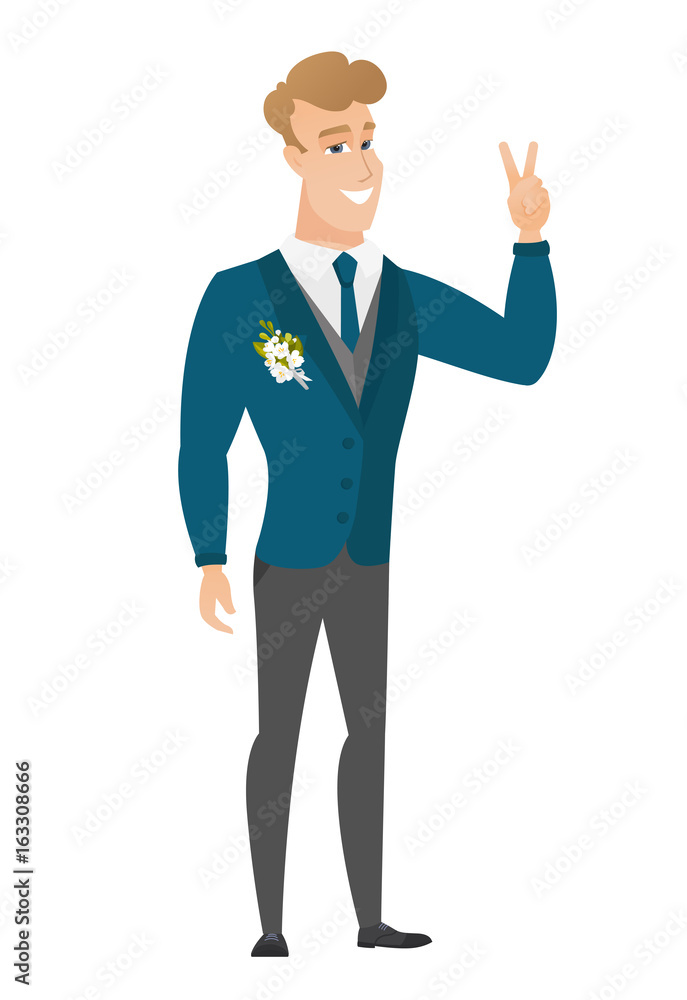 Caucasian groom showing the victory gesture.