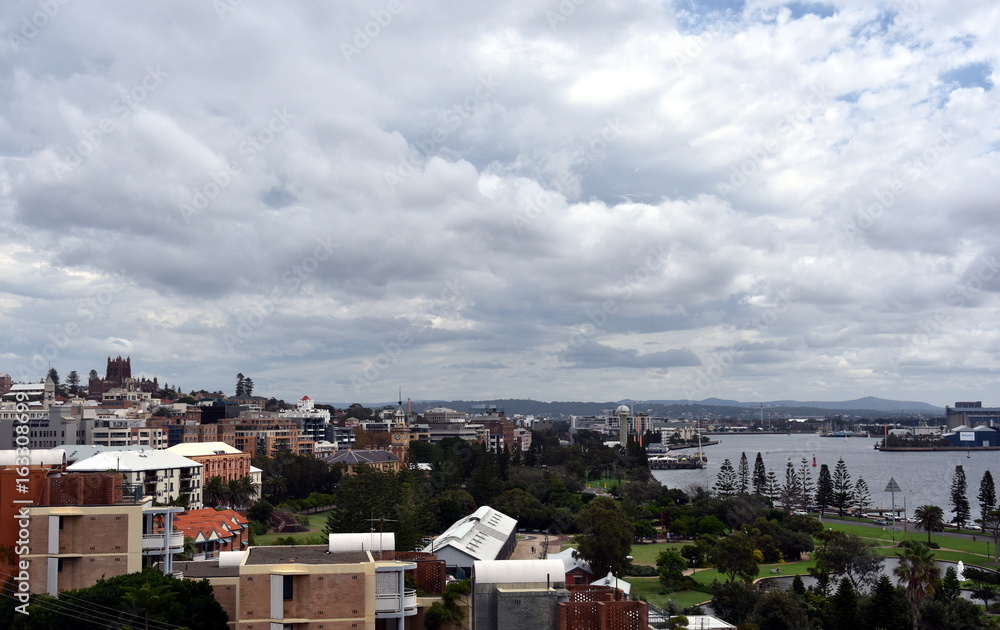 Panoramic view of Newcastle from Fort Scratchley (NSW, Australia). Christ Church Cathedral in the background on the left side, Hunter River on the right side.
