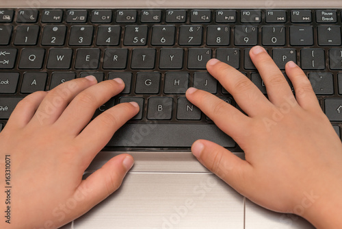 kid using a laptop