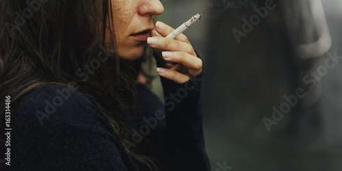 Homeless Adult Woman Smoking Cigarette Addiction photo