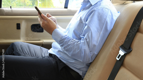 Business man in a car.