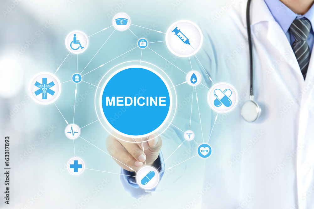 Doctor hand touching MEDICINE sign on virtual screen Doctor hand touching MEDICINE sign on virtual screen