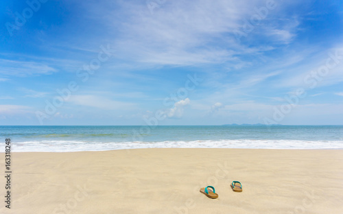 Fototapeta Naklejka Na Ścianę i Meble -  slippers on beautiful beach
