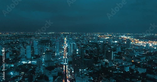 Aerial drone view of Bangkok during beautiful cloudy night photo