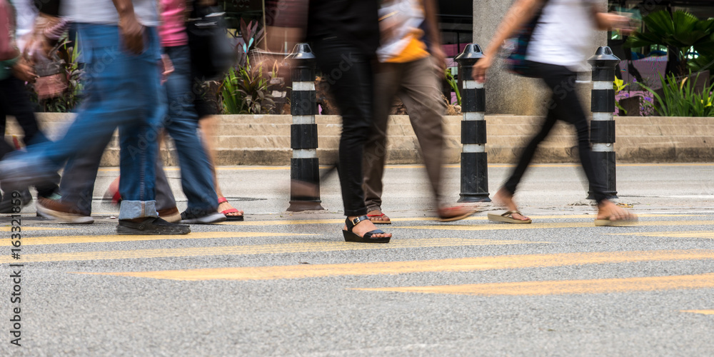 Motion Blur - People crossing the road. Blurry effect to illustrate movement Motion Blur - People crossing the road. Blurry effect to illustrate movement