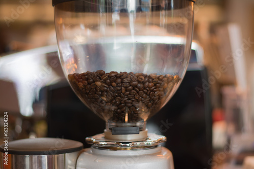 Coffee beans in the coffee machine, coffee beans in the coffee grinder.