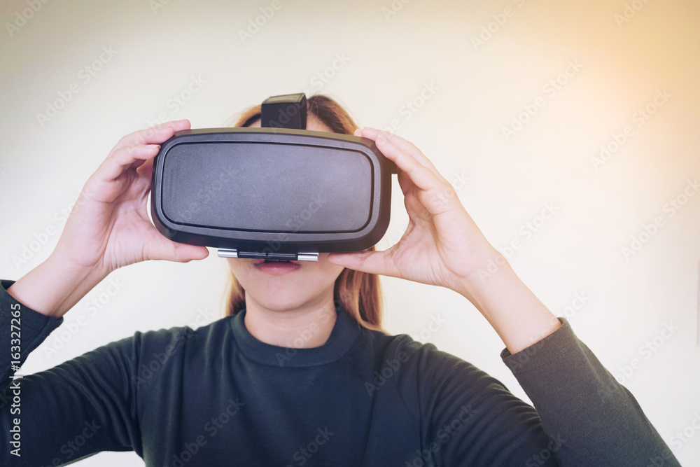 Woman wearing virtual reality glasses Woman wearing virtual reality glasses