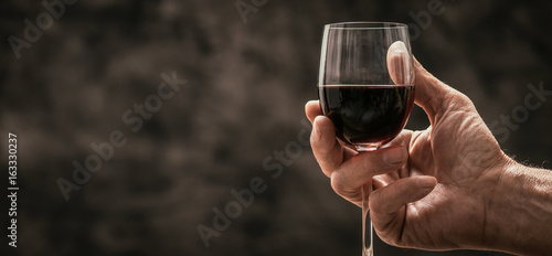 Картината върху платно Man tasting a glass of red wine