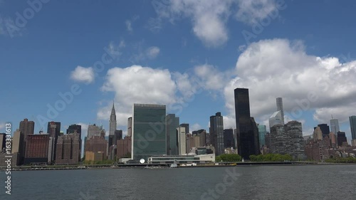 Viewing beautiful breathtaking Manhattan Skyline from Long Island City in New York, wide shot panorama with ONU,United Nations Headquarters,Ultra Hd 4k, real time