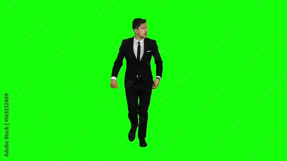 Man is a telephone rings to him and he talks. Green screen Man is a telephone rings to him and he talks. Green screen