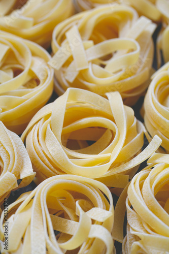 Close-up of uncooked nests of spaghetti