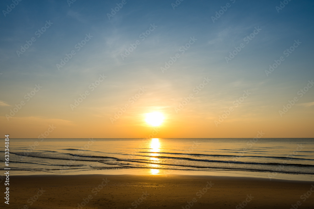 Sunrise on the sea beach