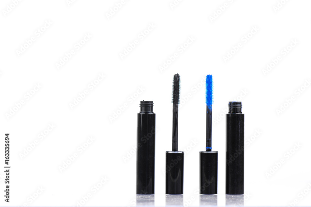 Obraz premium Blue And Black Mascara Isolated On White Background