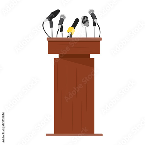 Wooden podium tribune with microphones.