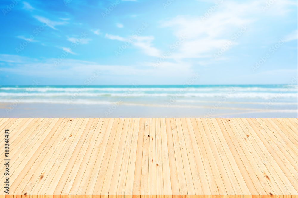 Empty white wooden table over blue sea background. Empty white wooden table over blue sea background.