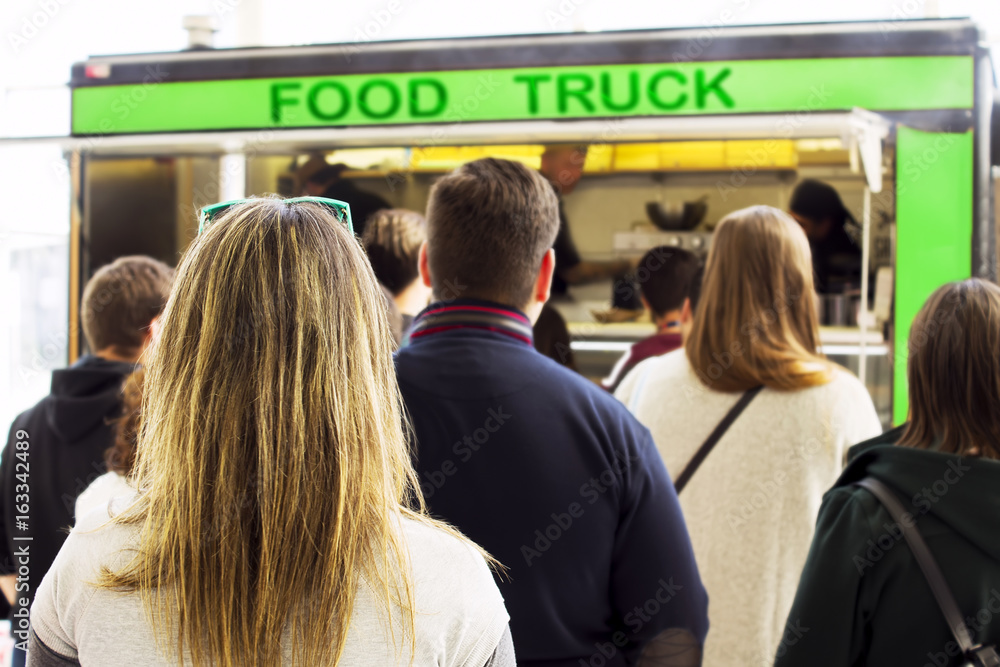 people queue in food truck , selective focus people queue in food truck , selective focus