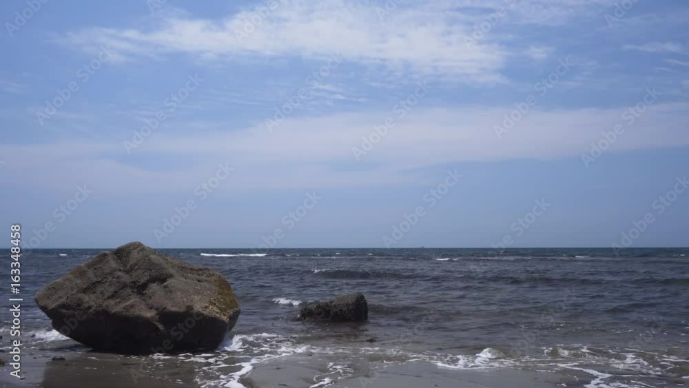 Big rock in front of the sea in the morning, Enoshima, Kanagawa Prefecture, Japan Big rock in front of the sea in the morning, Enoshima, Kanagawa Prefecture, Japan