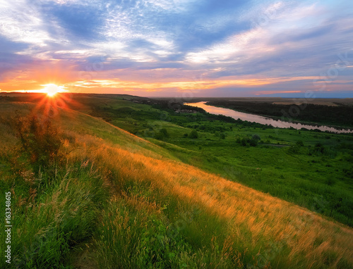 sunrise over the river valley and beautiful sky with clouds