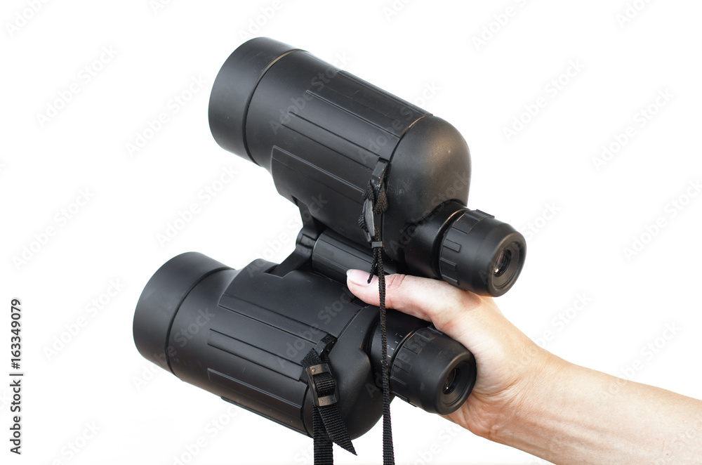 Binoculars isolated. Binoculars in hand. Binoculars isolated. Binoculars in hand.
