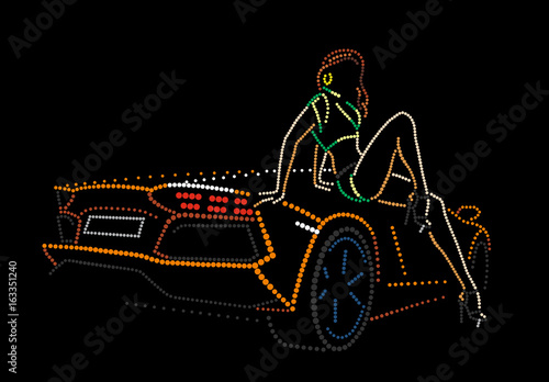 The girl sits by car