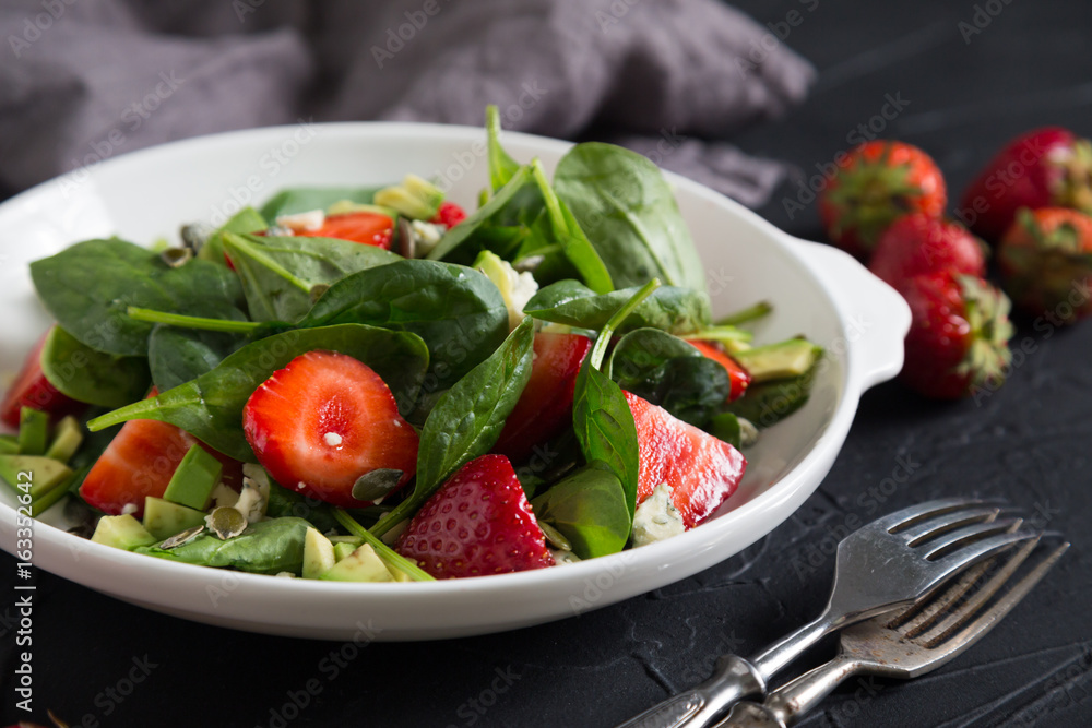 Salad with spinach fresh strawberries and cheese Salad with spinach fresh strawberries and cheese