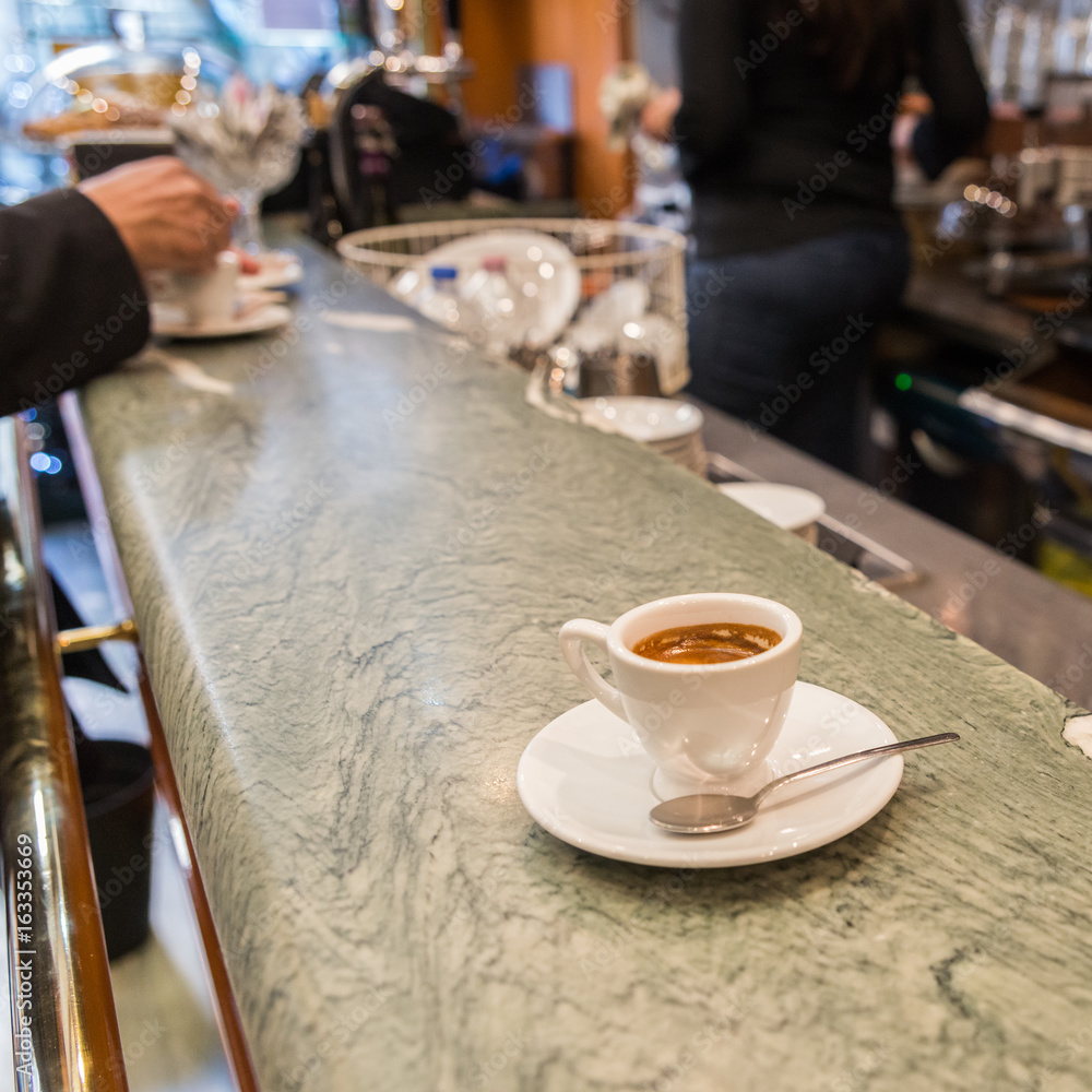 A espresso coffee on a balcony in a cafe A espresso coffee on a balcony in a cafe