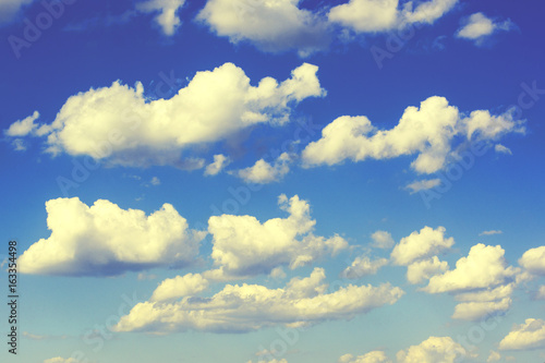 Blue sky with white clouds closeup natural © Masarik