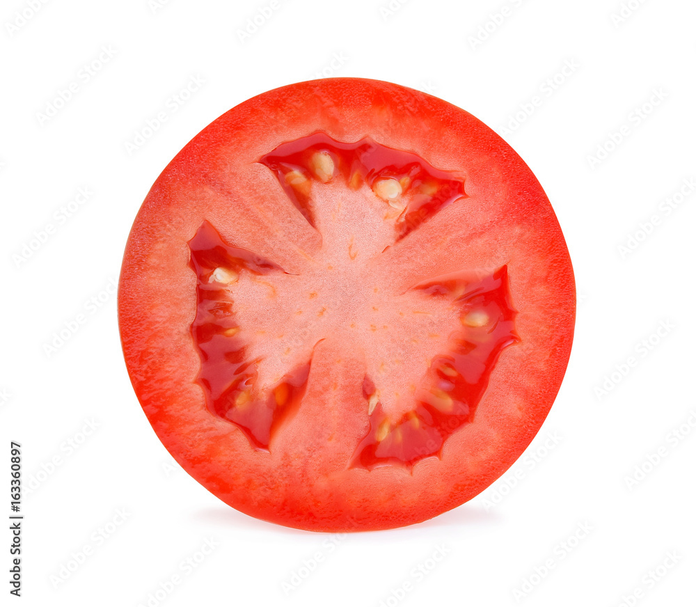 A half of fresh tomato isolated on white background. A half of fresh tomato isolated on white background.