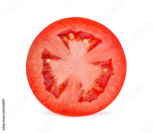 A half of fresh tomato isolated on white background.