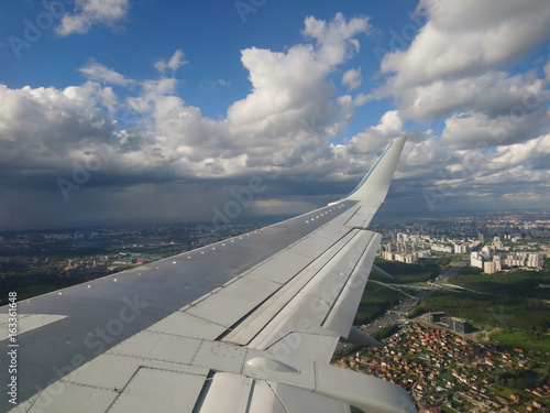 Photography Landing aircraft in airport at summer day