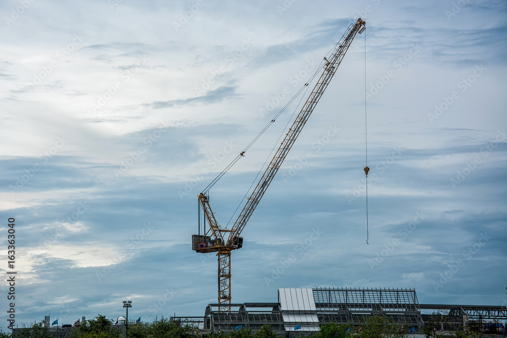 The construction crane,Sky background.