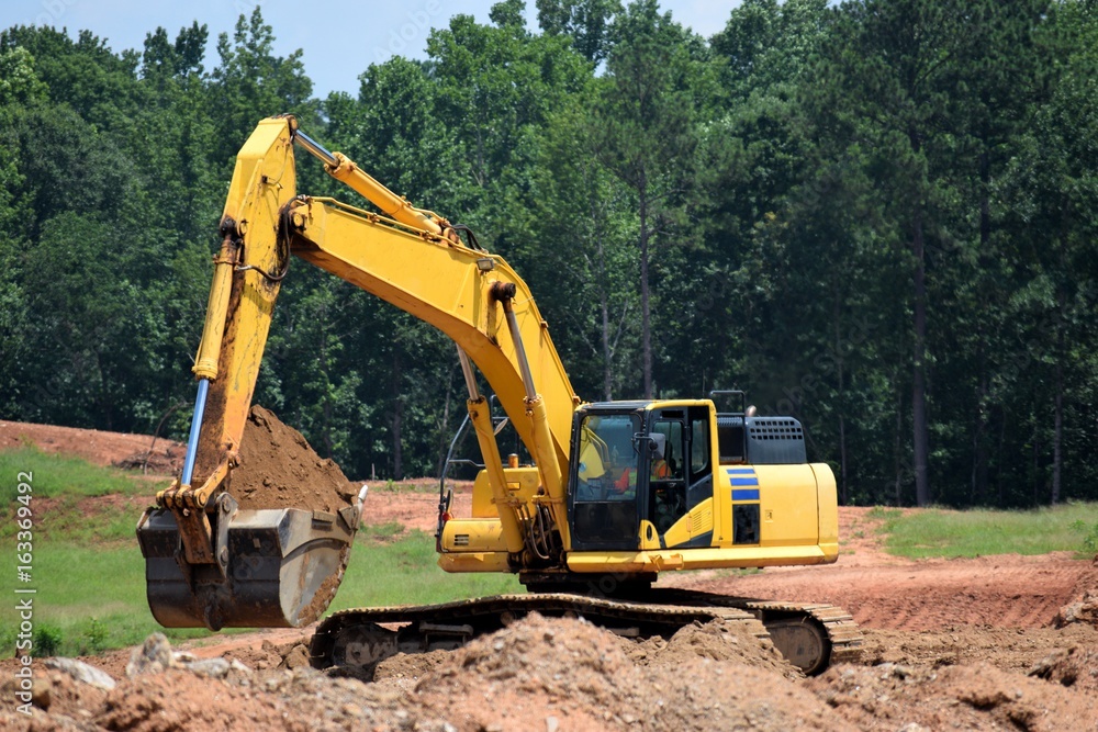 Backhoe at constructions site Georgia, USA Backhoe at constructions site Georgia, USA