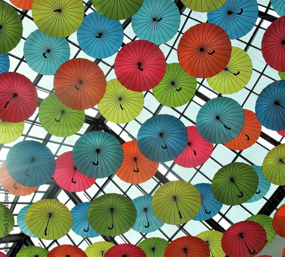 Colorful umbrellas hanging from the ceiling