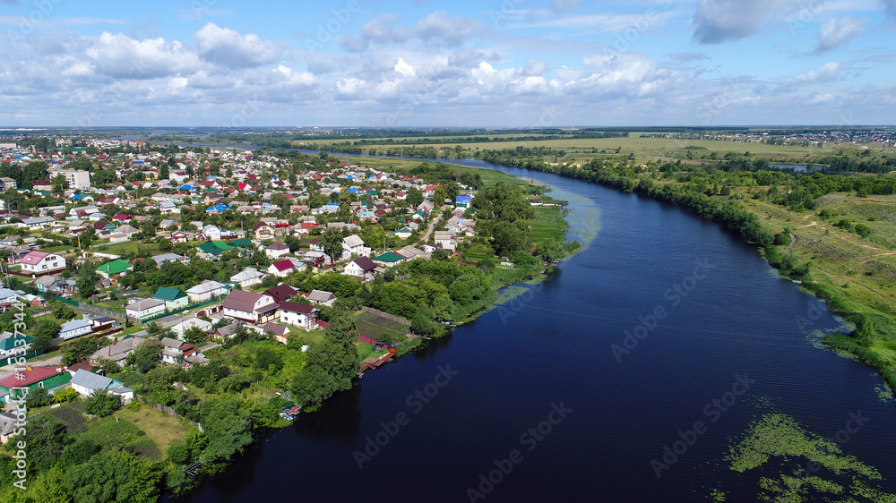 Fototapeta premium Top view of river Matyra and Gruazy town in Russia