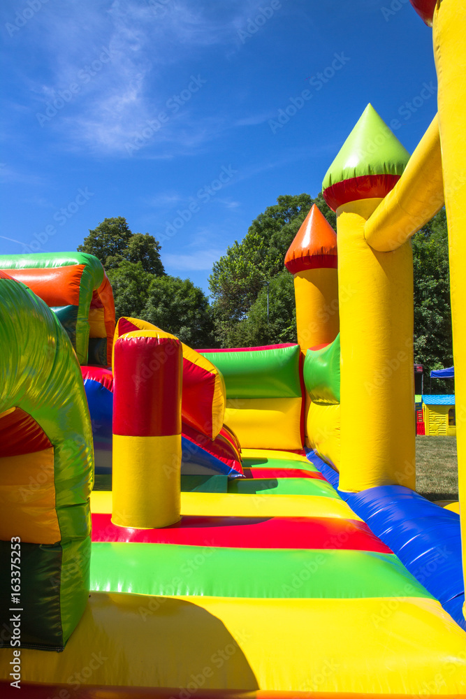 Inside inflatable big colofrull castle for kids in playground