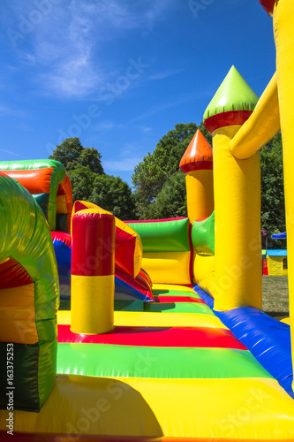 Obraz na płótnie Inside inflatable big colofrull castle for kids in playground w salonie
