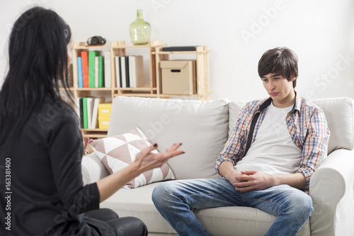 Boy teenager at a psychologist at the office's