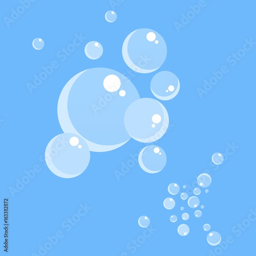 soap bubbles on blue