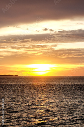 The Cargo between the sunset and the sea.