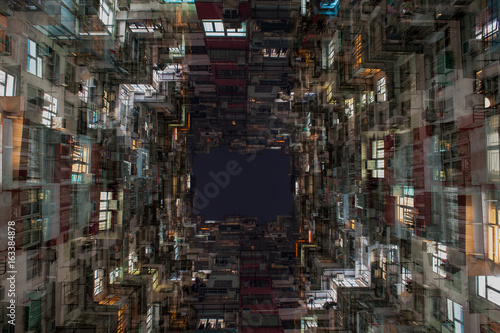 Traditional Hong Kong apartment building under double exposure © choikh