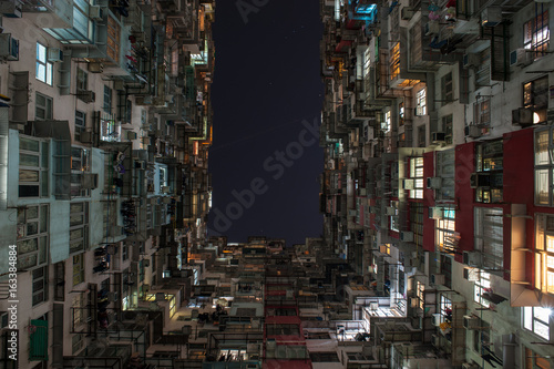 Crowed traditional apartment building with clear sky located in Quarry Bay, Hong Kong