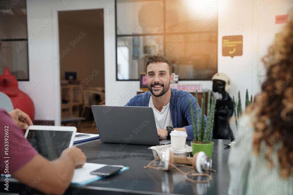 Portrait of man working in office, start-up Portrait of man working in office, start-up